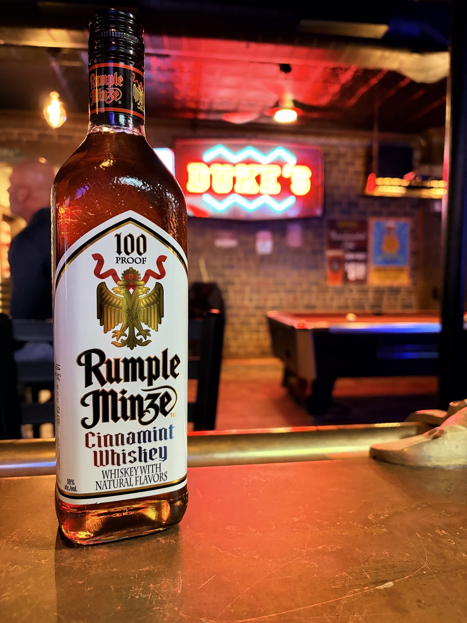 Liquor bottles with Duke's sign